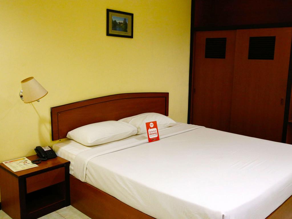 NIDA Rooms Gedung Penuin Shopping Center