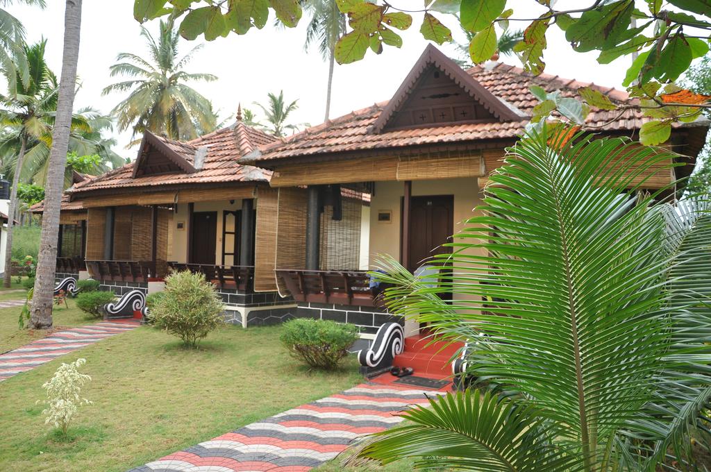 Maadathil Cottages